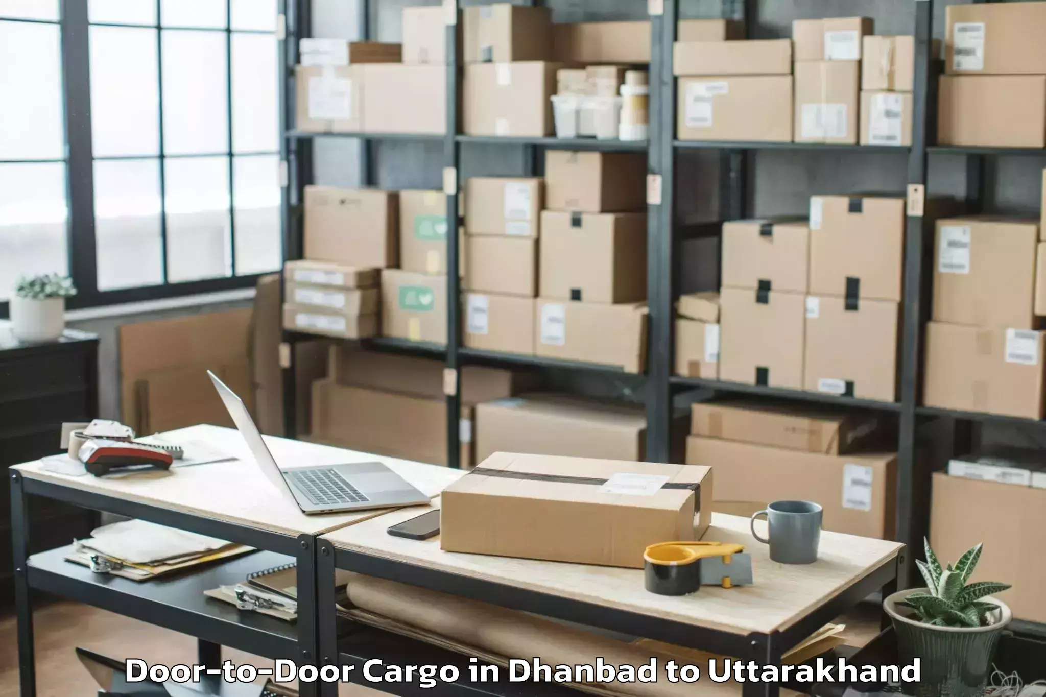 Top Dhanbad to Pokhari Door To Door Cargo Available